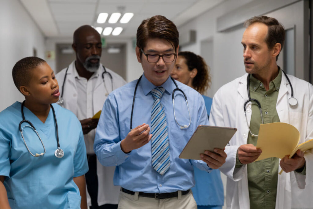Diverse group of medical personnel collaborating